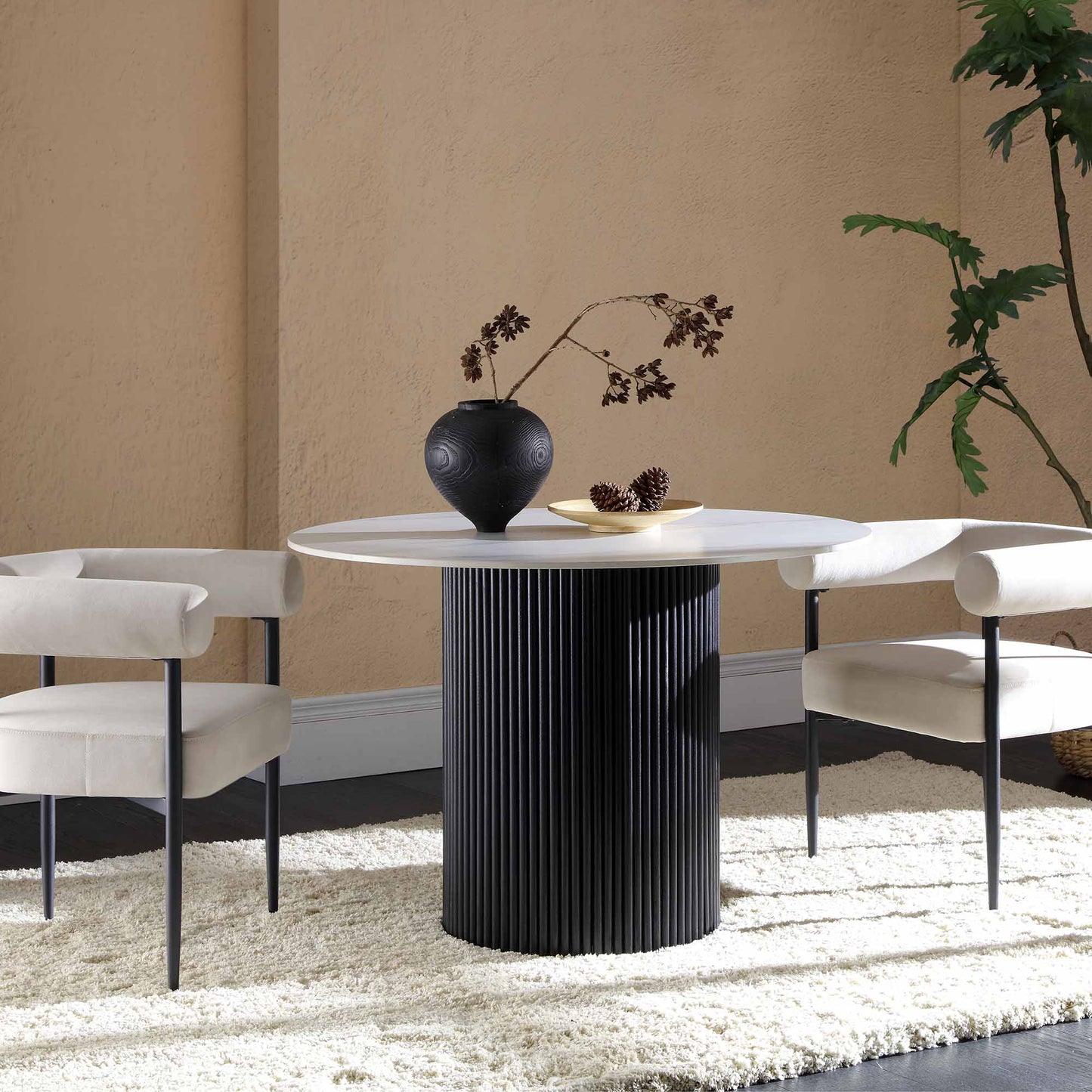 Maru Ceramic Top Black Pedestal Round Dining Table