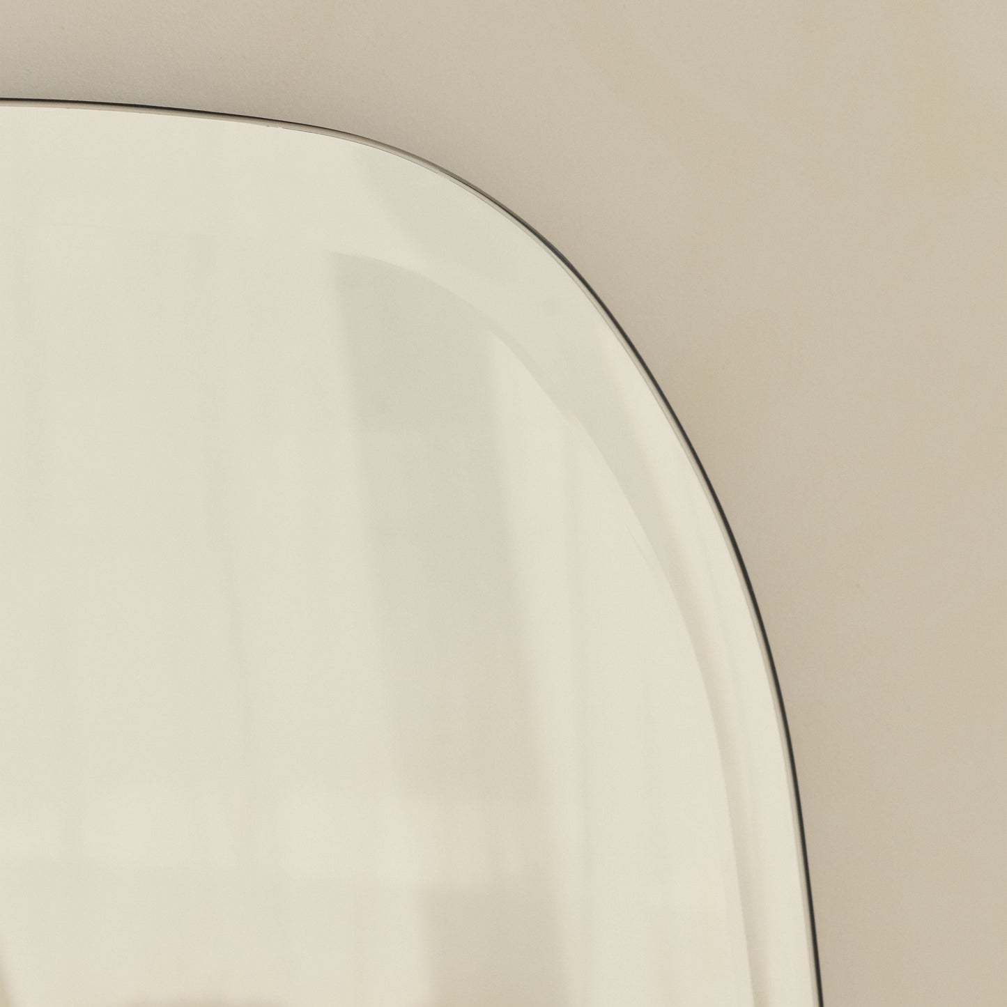 Vienna - Large Frameless Curved Bevelled Mirror 100cm x 65cm