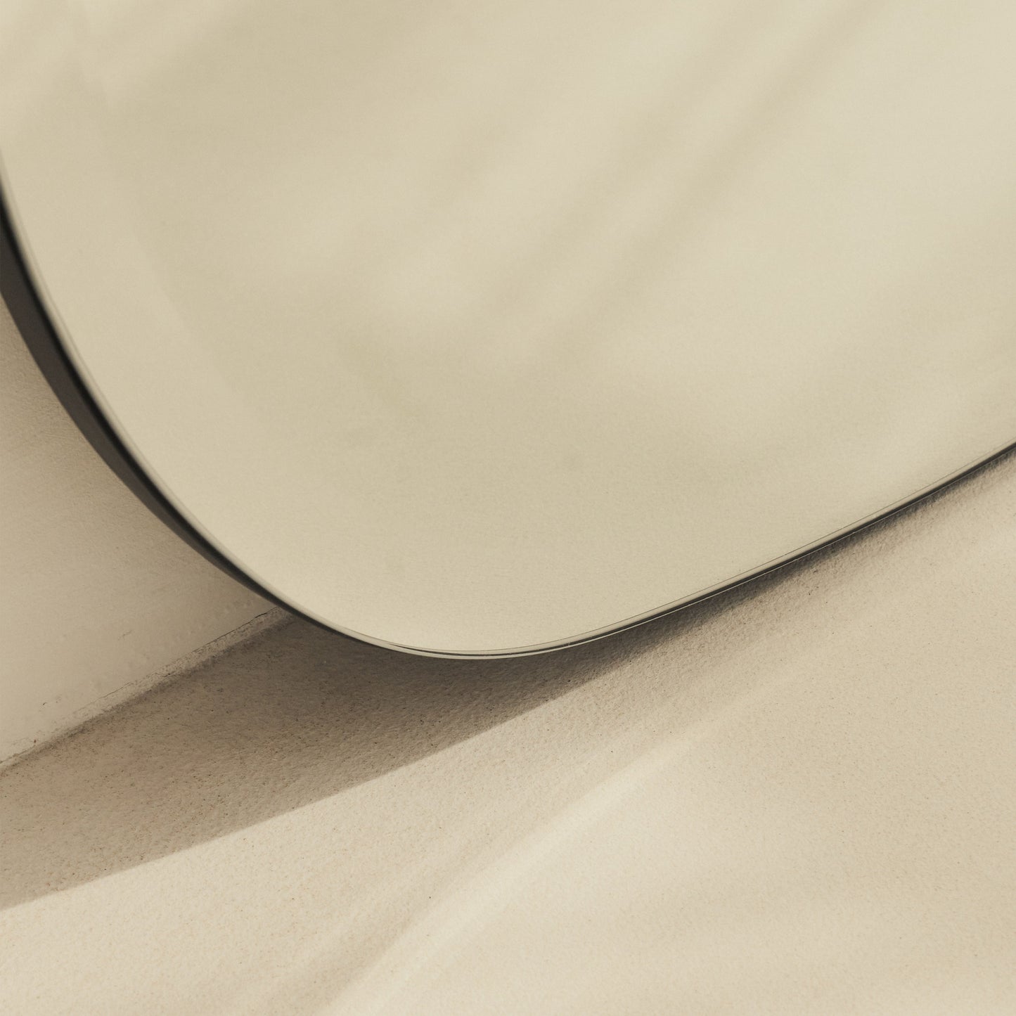 Vienna - Large Frameless Curved Bevelled Mirror 100cm x 65cm