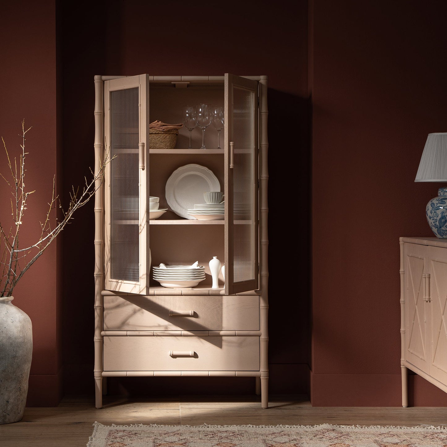 Elstowe Faux Bamboo and Fluted Glass 2-Door Cabinet, Nude Pink